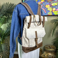 Myra Bag Pre-owned Perfect Backpack Hair on Hide, Leather, Canvas Fold over zipper top -